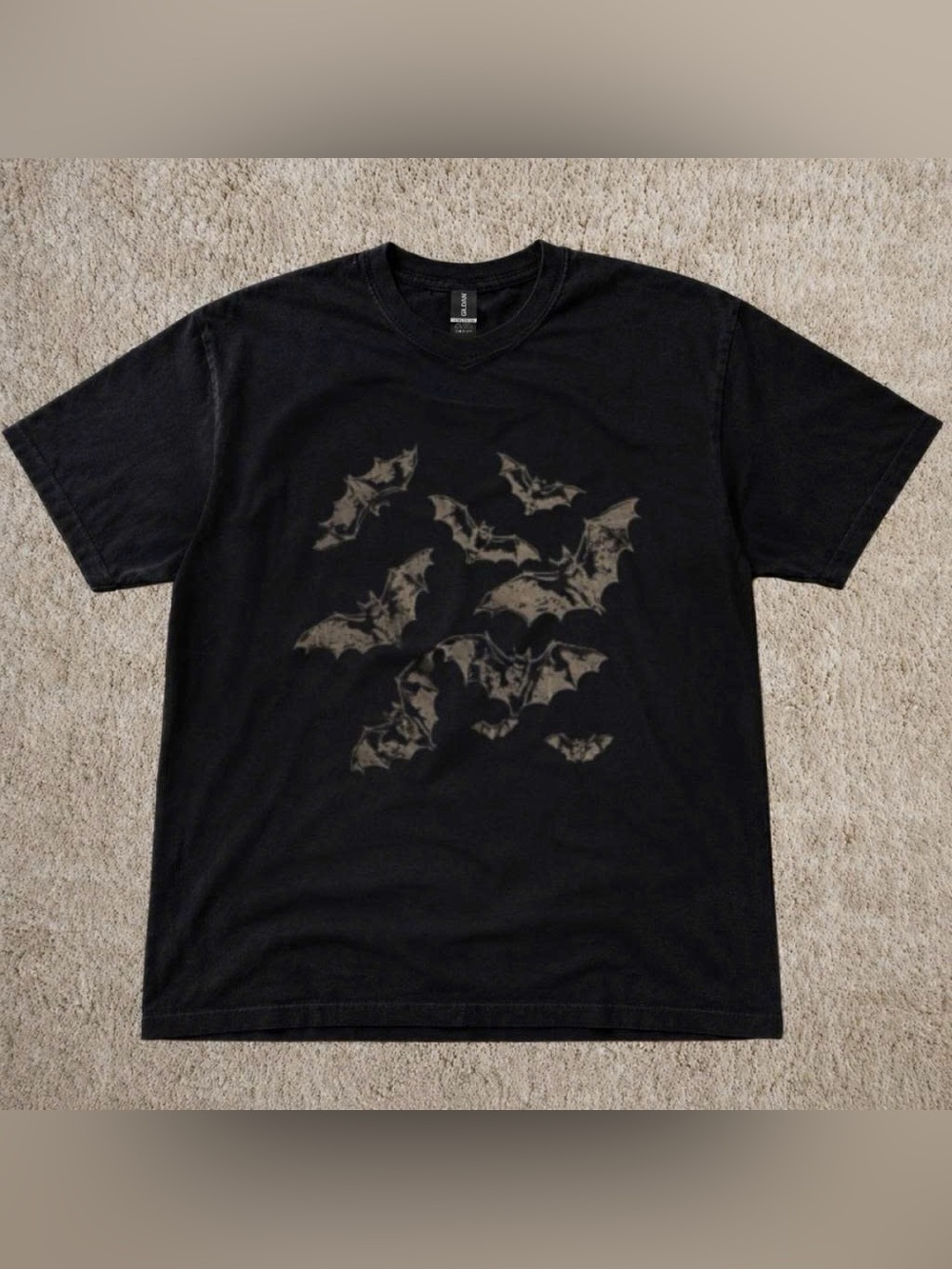 Black Short-Sleeve Tee with Subtle Bat Design
